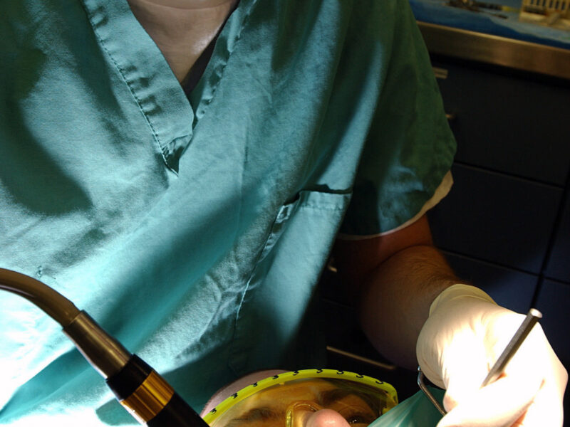 040324-N-8213G-148
USS Ronald Reagan (CVN 76), March 24, 2004 – Lt. Cmdr. David Craig, of Brilliant, Ohio, performs a root canal on his patient, Machinist Mate 2nd Class (SW) Ben Farrell of 
St. Paul, Minn. The ship is preparing to leave for its homeport in San Diego, and is undergoing a six-month Post Shakedown Availability period at Northrop Grumman Newport News Shipbuilding, Newport News, Va. U.S. Navy photo by Photographer's Mate Airman Konstandinos Goumenidis. RELEASE